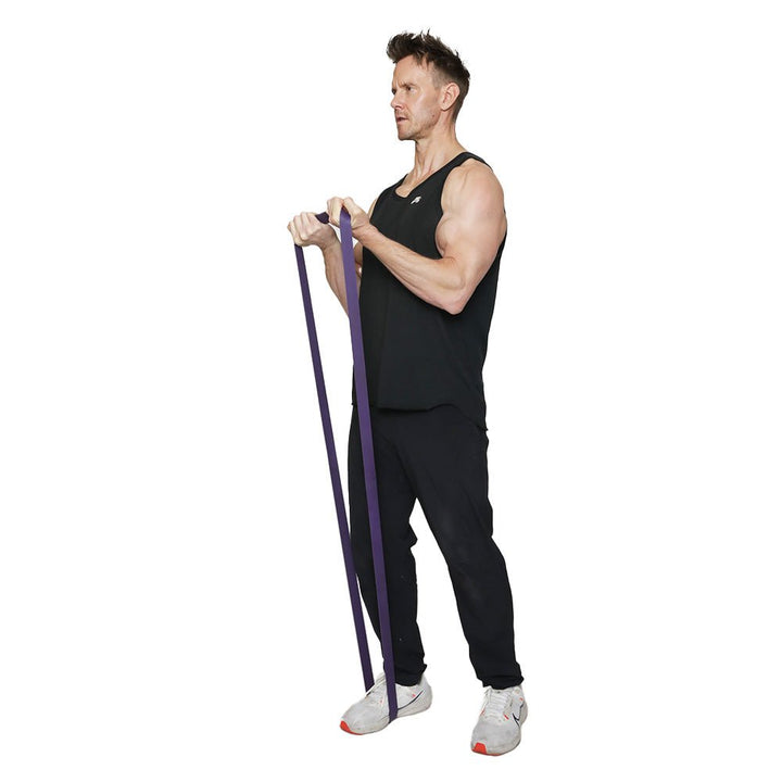 Man using a violet Resistance Band - Powertec