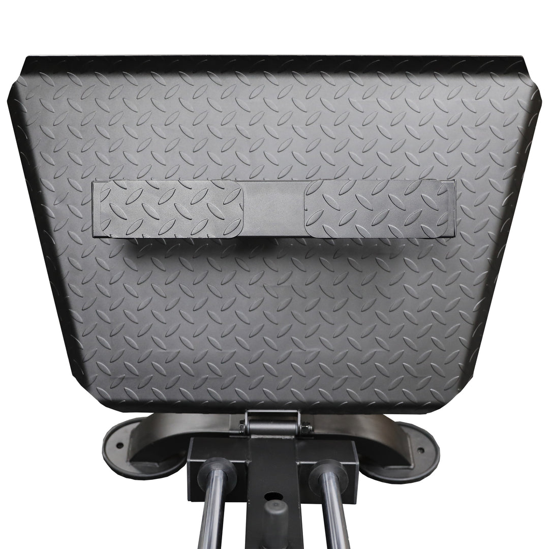 Close‑up of sled carriage wheels and steel guide rods demonstrating nylon‑bearing assembly for smooth motion.