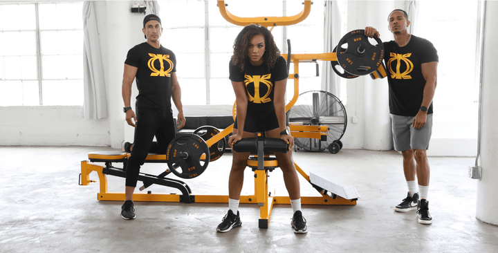 2 male and one female posing in front of a Workbench Multisystem®