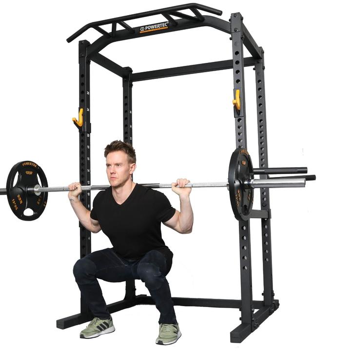 Workbench® Power Rack Black with Athlete Squatting | Powertec | Home Gym Equipment | Ultimate Strength Building Machines