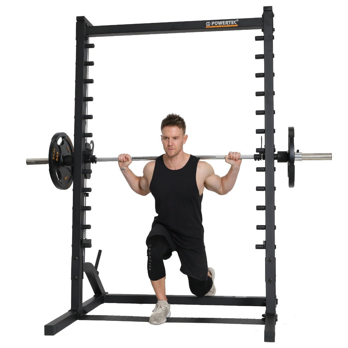 Image of Rob Riches using the Powertec Smith Machine.